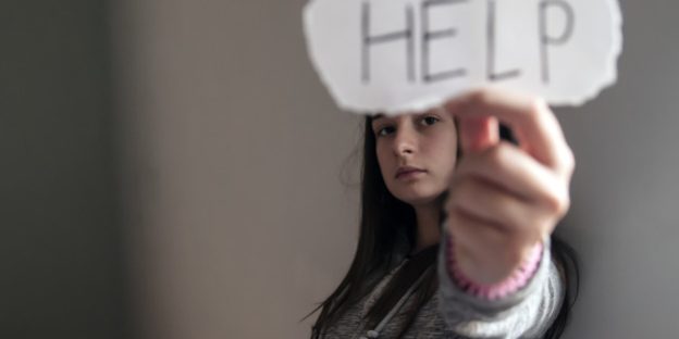 HEL, Teenager with help sign